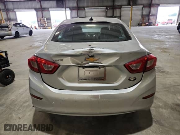 2018 Chevrolet Cruze LS с VIN 1G1BC5SM9J7211261, выставлен на аукционе Copart как лот 62481265 с пробегом 146 382 миль миль и Списание • Salvage title. История ставок и продаж доступна на DreamBid. Изображение 6.
