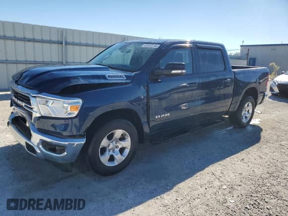 2021 Ram 1500 Big Horn with VIN 1C6RREFG6MN589974, listed as a Copart auction lot 82970744 with 43,167 mi miles and Salvage title. Bid and sale history available at DreamBid. Image 1.