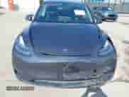 2022 Tesla Model Y Long Range z VIN 7SAYGAEE7NF389319, wystawiony jako IAAI lot #42492523 z przebiegiem Nie podano mil oraz . Historia ofert i sprzedaży dostępna na DreamBid. Obrazek 6.