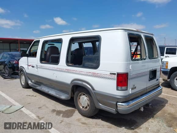 1999 Ford Econoline Cargo Recreational with VIN 1FDRE14L2XHA41059, listed as a IAAI auction lot 42067879 with 149,185 mi miles and . Bid and sale history available at DreamBid. Image 14.