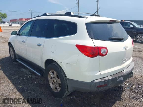 2012 Chevrolet Traverse 2LT with VIN 1GNKRJED5CJ206940, listed as a IAAI auction lot 42762972 with 115,634 mi miles and . Bid and sale history available at DreamBid. Image 3.