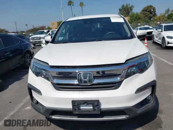 2020 Honda Pilot EX z VIN 5FNYF5H3XLB025409, wystawiony jako IAAI lot #42944660 z przebiegiem 78 876 mil mil oraz . Historia ofert i sprzedaży dostępna na DreamBid. Obrazek 12.