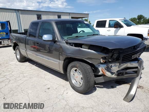2000 GMC Sierra 1500 SLE with VIN 1GTEC19V3YZ352742, listed as a Copart auction lot 57746955 with 194,947 mi miles and Salvage title. Bid and sale history available at DreamBid. Image 4.