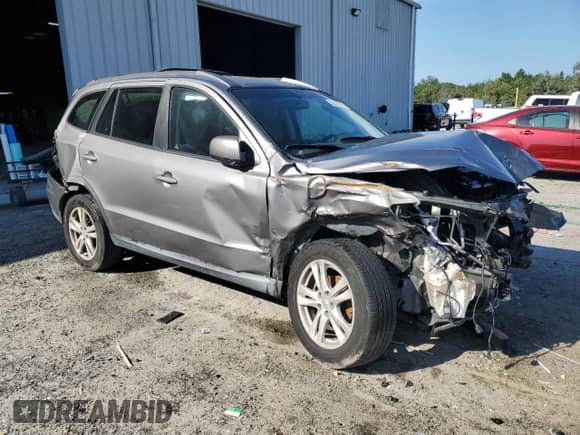 2010 Hyundai Santa Fe SE z VIN 5NMSH4AG7AH400692, wystawiony jako Copart lot #82026345 z przebiegiem 111 519 mil mil oraz Szkoda całkowita • Salvage title. Historia ofert i sprzedaży dostępna na DreamBid. Obrazek 4.