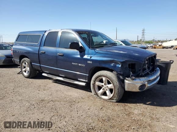 2007 Dodge 1500 SLT with VIN 1D7HA18297J588129, listed as a Copart auction lot 86981925 with 215,816 mi miles and Salvage title. Bid and sale history available at DreamBid. Image 4.