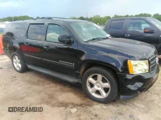 2007 Chevrolet Suburban LTZ z VIN 3GNFC16097G247674, wystawiony jako IAAI lot #42168577 z przebiegiem 217 864 mil mil oraz . Historia ofert i sprzedaży dostępna na DreamBid. Obrazek 1.