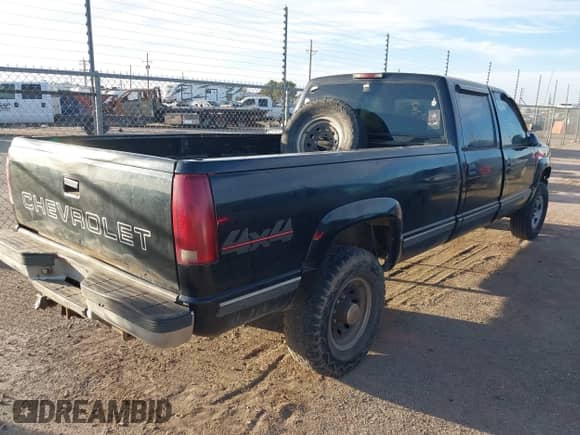 1999 Chevrolet Silverado 3500 with VIN 1GCHK33R3XF030643, listed as a IAAI auction lot 43285166 with 359,934 mi miles and . Bid and sale history available at DreamBid. Image 4.