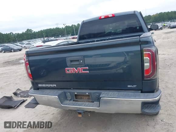 2017 GMC Sierra 1500 SLT with VIN 3GTU2NECXHG281694, listed as a IAAI auction lot 43170763 with 164,541 mi miles and . Bid and sale history available at DreamBid. Image 16.