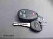 2013 Chevrolet Traverse LT z VIN 1GNKRGKD4DJ128028, wystawiony jako IAAI lot #42000318 z przebiegiem 188 812 mil mil oraz . Historia ofert i sprzedaży dostępna na DreamBid. Obrazek 11.