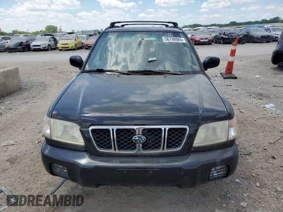 2002 Subaru Forester S with VIN JF1SF65682H715156, listed as a Copart auction lot 56798065 with 88,599 mi miles and Clean title. Bid and sale history available at DreamBid. Image 5.