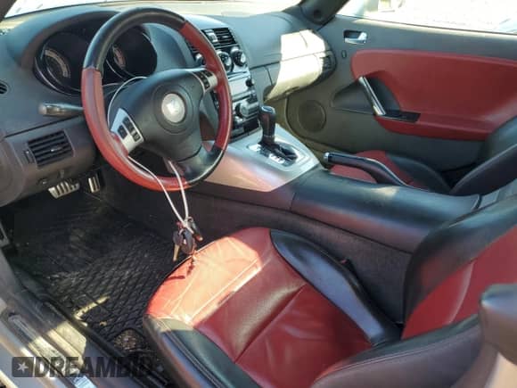 2009 Saturn Sky Red Line с VIN 1G8MT35X59Y104413, выставлен на аукционе Copart как лот 84166785 с пробегом 82 261 миль миль и Списание • Salvage title. История ставок и продаж доступна на DreamBid. Изображение 8.