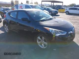 2012 Hyundai Veloster w/Red Int с VIN KMHTC6AD2CU029761, выставлен на аукционе IAAI как лот 43603146 с пробегом 64 357 миль миль и . История ставок и продаж доступна на DreamBid. Изображение 1.