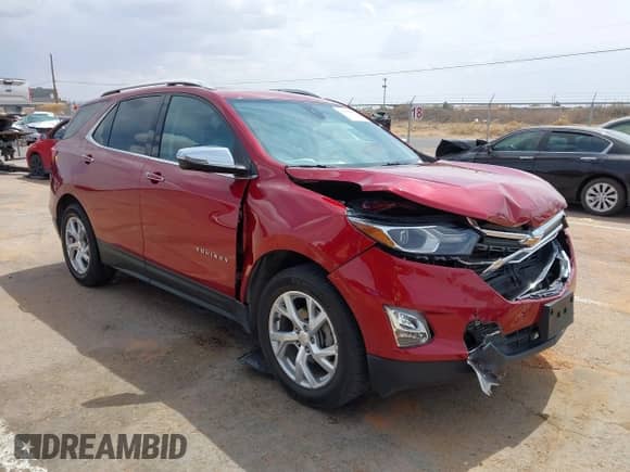 2021 Chevrolet Equinox Premier with VIN 2GNAXXEV4M6149948, listed as a IAAI auction lot 41856393 with 75,136 mi miles and . Bid and sale history available at DreamBid. Image 1.