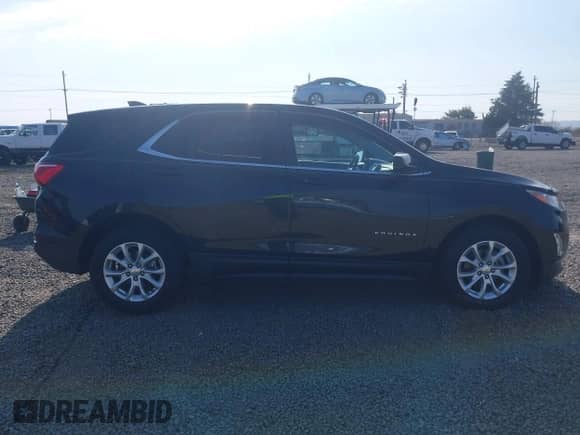 2021 Chevrolet Equinox LT z VIN 2GNAXUEV5M6119033, wystawiony jako IAAI lot #43224056 z przebiegiem 87 155 mil mil oraz . Historia ofert i sprzedaży dostępna na DreamBid. Obrazek 13.