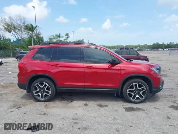 2023 Honda Passport Elite z VIN 5FNYF8H01PB031645, wystawiony jako IAAI lot #42495265 z przebiegiem 29 633 mil mil oraz . Historia ofert i sprzedaży dostępna na DreamBid. Obrazek 14.