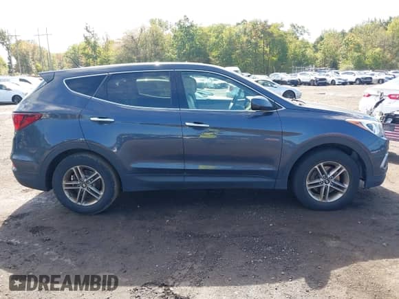 2018 Hyundai Santa Fe 2.4L with VIN 5NMZTDLB9JH071864, listed as a IAAI auction lot 43302156 with 127,581 mi miles and . Bid and sale history available at DreamBid. Image 13.