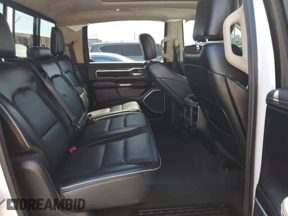 2020 Ram 1500 Laramie z VIN 1C6SRFJM6LN208434, wystawiony jako Copart lot #58059085 z przebiegiem 64 786 mil mil oraz Szkoda całkowita • Salvage title. Historia ofert i sprzedaży dostępna na DreamBid. Obrazek 10.