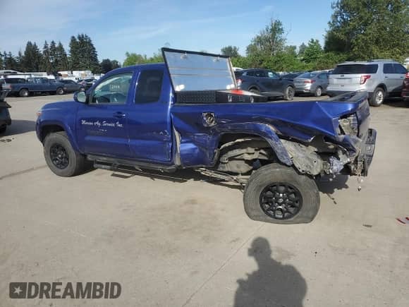 2022 Toyota Tacoma SR z VIN 3TYSZ5AN0NT091172, wystawiony jako Copart lot #56365785 z przebiegiem Nie podano mil oraz Szkoda całkowita • Salvage title. Historia ofert i sprzedaży dostępna na DreamBid. Obrazek 2.