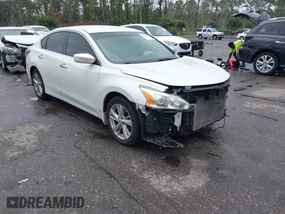 2015 Nissan Altima S z VIN 1N4AL3AP2FC579076, wystawiony jako IAAI lot #43417561 z przebiegiem 162 679 mil mil oraz . Historia ofert i sprzedaży dostępna na DreamBid. Obrazek 1.