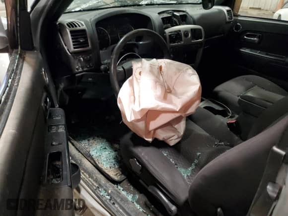 2012 Chevrolet Colorado с VIN 1GCJTDFEXC8115846, выставлен на аукционе Copart как лот 88748375 с пробегом Не указан миль и Списание • Salvage title. История ставок и продаж доступна на DreamBid. Изображение 8.