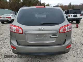 2012 Hyundai Santa Fe GLS с VIN 5XYZGDAB8CG111324, выставлен на аукционе Copart как лот 90451695 с пробегом 219 291 миль миль и Чистый • Clean title. История ставок и продаж доступна на DreamBid. Изображение 6.