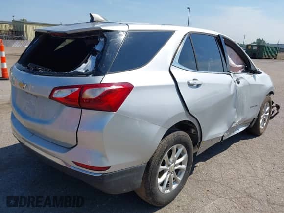2019 Chevrolet Equinox LT z VIN 2GNAXJEV7K6230579, wystawiony jako IAAI lot #42834271 z przebiegiem 96 912 mil mil oraz . Historia ofert i sprzedaży dostępna na DreamBid. Obrazek 4.