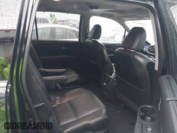 2020 Honda Pilot Touring 7-Passenger z VIN 5FNYF5H64LB000287, wystawiony jako IAAI lot #41288778 z przebiegiem 58 568 mil mil oraz . Historia ofert i sprzedaży dostępna na DreamBid. Obrazek 8.