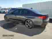 2020 BMW 5 Series M550i xDrive with VIN WBAJS7C06LCD34796, listed as a Copart auction lot 90484235 with 58,399 mi miles and Clean title. Bid and sale history available at DreamBid. Image 2.