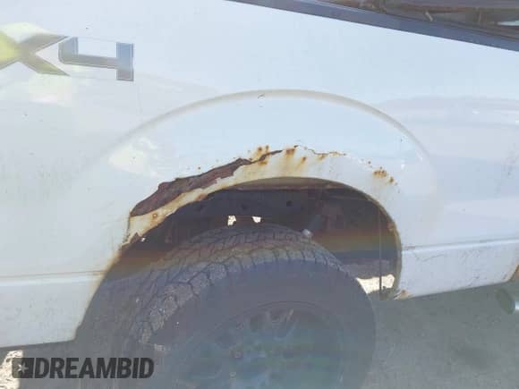 2014 Ford F-150 FX4 with VIN 1FTFW1ET6EFA57504, listed as a IAAI auction lot 43411648 with 213,926 mi miles and . Bid and sale history available at DreamBid. Image 6.