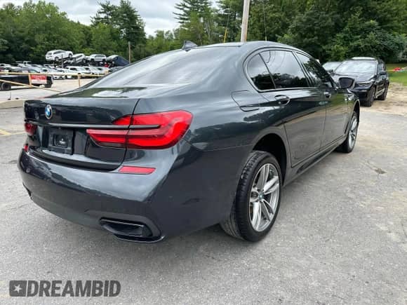 2019 BMW 7 Series 740i xDrive with VIN WBA7E4C55KGV28722, listed as a Copart auction lot 64955445 with 94,901 mi miles and Clean title. Bid and sale history available at DreamBid. Image 3.