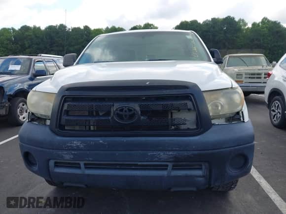 2012 Toyota Tundra z VIN 5TFRU5F10CX026554, wystawiony jako IAAI lot #43010233 z przebiegiem 221 656 mil mil oraz . Historia ofert i sprzedaży dostępna na DreamBid. Obrazek 12.