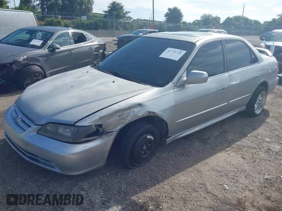 2002 Honda Accord EX with VIN 1HGCG56682A088280, listed as a IAAI auction lot 42774728 with 183,183 mi miles and . Bid and sale history available at DreamBid. Image 2.