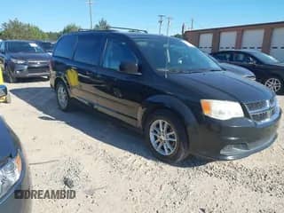 2014 Dodge Grand Caravan SXT with VIN 2C4RDGCG5ER122475, listed as a IAAI auction lot 43423105 with 189,985 mi miles and . Bid and sale history available at DreamBid. Image 1.