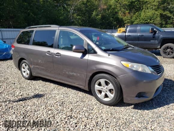 2012 Toyota Sienna LE AAS with VIN 5TDKK3DC8CS271513, listed as a Copart auction lot 71648315 with 259,436 mi miles and Clean title. Bid and sale history available at DreamBid. Image 4.
