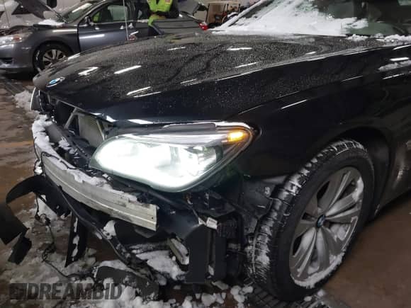 2013 BMW 7 Series 740Li xDrive with VIN WBAYF4C56DD127914, listed as a IAAI auction lot 41370207 with 138,619 mi miles and . Bid and sale history available at DreamBid. Image 6.
