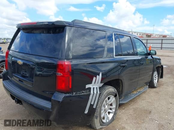 2017 Chevrolet Tahoe LT with VIN 1GNSCBKC0HR122195, listed as a IAAI auction lot 40189425 with Not provided miles and . Bid and sale history available at DreamBid. Image 4.