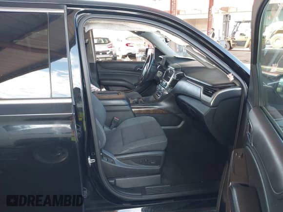 2015 Chevrolet Tahoe LS with VIN 1GNSCAKC0FR711917, listed as a IAAI auction lot 43241350 with 181,124 mi miles and . Bid and sale history available at DreamBid. Image 5.