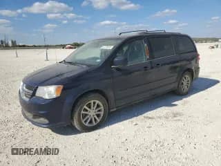2015 Dodge Grand Caravan SXT z VIN 2C4RDGCG7FR679907, wystawiony jako Copart lot #87275015 z przebiegiem 200 212 mil mil oraz Czysty tytuł • Clean title. Historia ofert i sprzedaży dostępna na DreamBid. Obrazek 1.