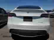 2021 Tesla Model Y Long Range with VIN 5YJYGDEEXMF112483, listed as a Copart auction lot 68286045 with 54,154 mi miles and Salvage title. Bid and sale history available at DreamBid. Image 6.