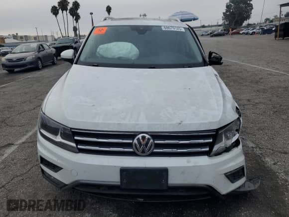 2020 Volkswagen Tiguan SE с VIN 3VV2B7AX2LM073381, выставлен на аукционе Copart как лот 69079125 с пробегом 130 639 миль миль и Списание • Salvage title. История ставок и продаж доступна на DreamBid. Изображение 5.