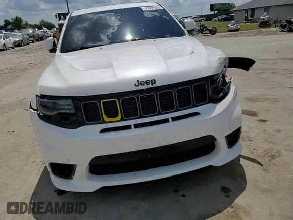 2018 Jeep Grand Cherokee Trackhawk z VIN 1C4RJFN9XJC223824, wystawiony jako Copart lot #67091665 z przebiegiem 116 095 mil mil oraz Szkoda całkowita • Salvage title. Historia ofert i sprzedaży dostępna na DreamBid. Obrazek 14.