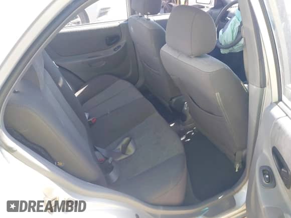 2004 Hyundai Accent GL z VIN KMHCG45C74U567268, wystawiony jako IAAI lot #42444194 z przebiegiem 182 380 mil mil oraz . Historia ofert i sprzedaży dostępna na DreamBid. Obrazek 8.