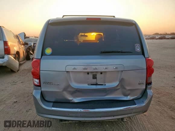 2014 Dodge Grand Caravan SXT with VIN 2C4RDGCG5ER477307, listed as a Copart auction lot 84047895 with 152,010 mi miles and Salvage title. Bid and sale history available at DreamBid. Image 6.