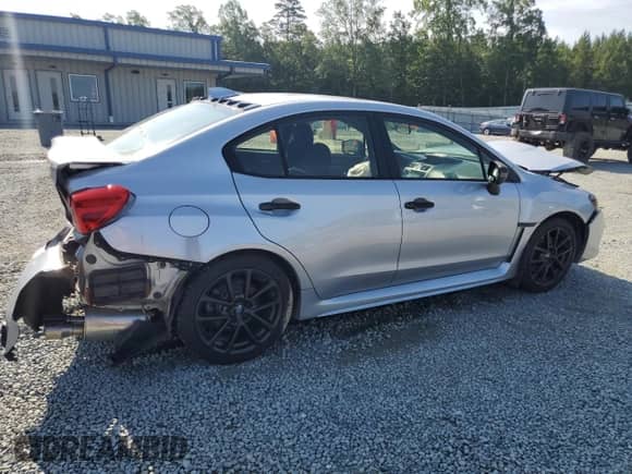 2020 Subaru WRX Premium with VIN JF1VA1C65L9803952, listed as a Copart auction lot 59917835 with 94,664 mi miles and Salvage title. Bid and sale history available at DreamBid. Image 3.