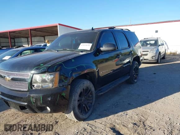 2007 Chevrolet Tahoe LTZ with VIN 1GNFK13027R249676, listed as a IAAI auction lot 43424132 with 296,751 mi miles and . Bid and sale history available at DreamBid. Image 2.