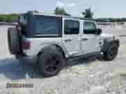 2023 Jeep Wrangler Willys with VIN 1C4HJXDG5PW653950, listed as a Copart auction lot 61857165 with 19,633 mi miles and Salvage title. Bid and sale history available at DreamBid. Image 3.