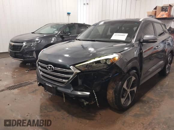 2018 Hyundai Tucson Value z VIN KM8J33A28JU615981, wystawiony jako IAAI lot #42281881 z przebiegiem 71 835 mil mil oraz . Historia ofert i sprzedaży dostępna na DreamBid. Obrazek 6.