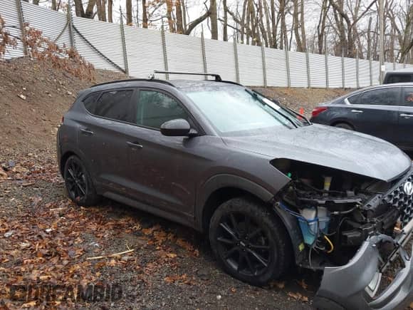 2019 Hyundai Tucson Ultimate with VIN KM8J3CAL0KU020133, listed as a IAAI auction lot 41856333 with 93,772 mi miles and . Bid and sale history available at DreamBid. Image 14.