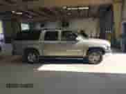 2002 Chevrolet Suburban LT z VIN 1GNFK16Z12J251677, wystawiony jako IAAI lot #42615302 z przebiegiem 167 234 mil mil oraz . Historia ofert i sprzedaży dostępna na DreamBid. Obrazek 13.