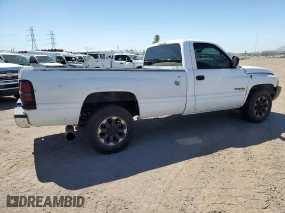 2001 Dodge RAM with VIN 3B6KC26ZX1M269062, listed as a Copart auction lot 56879715 with 172,568 mi miles and Salvage title. Bid and sale history available at DreamBid. Image 3.
